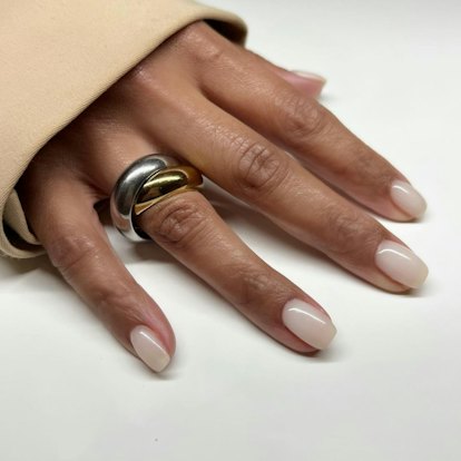 One of the most popular winter nail polish color trends for 2024 is milky white.