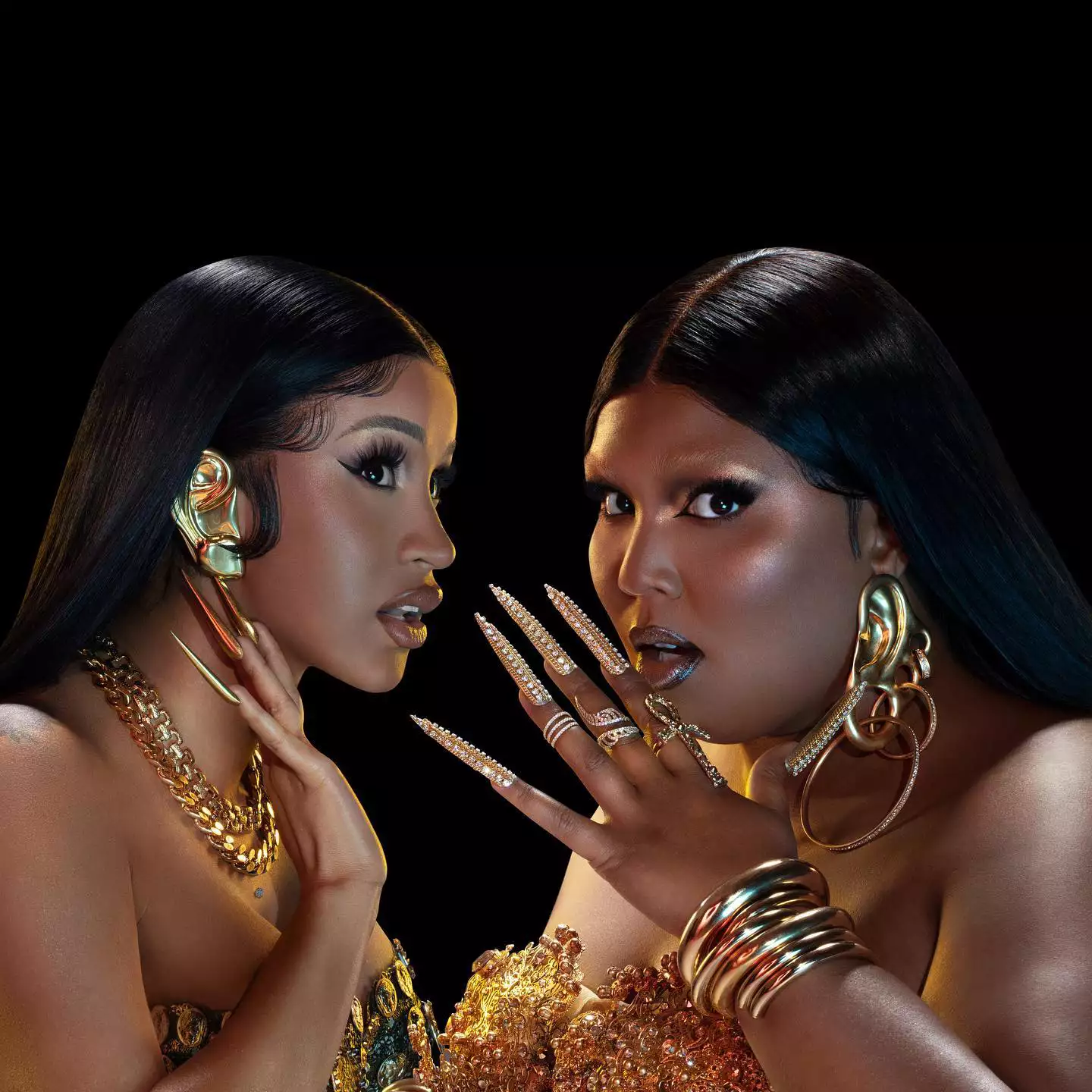 Cardi B (left) and Lizzo (right) with long gold nails