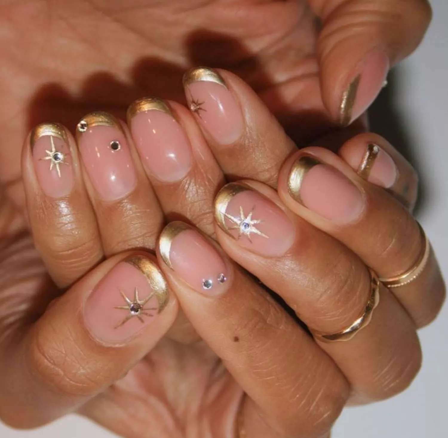 gold french tips with stars