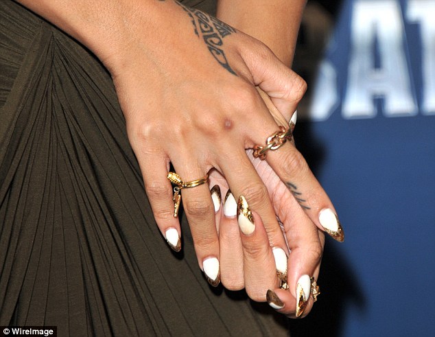 Copycat: According to the survey of 1,000 U.S. adults by nail fashion expert Bundle Monster, one in six has tried to imitate the nail colors and designs they spot on celebrity nails (pictured: Rihanna)