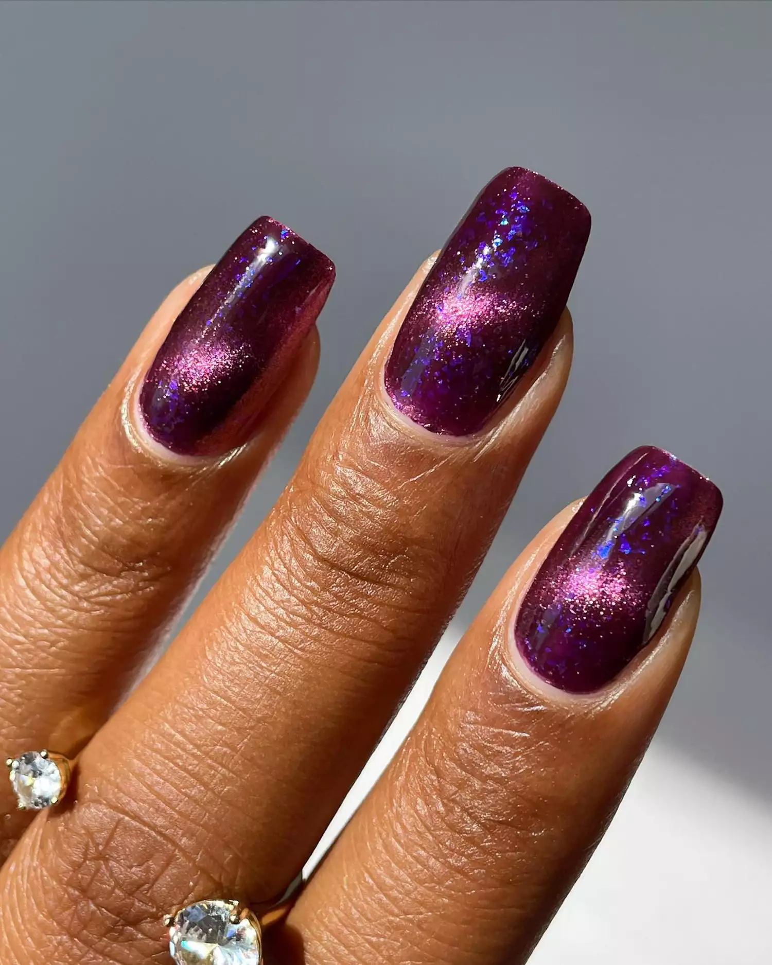 Close up of a purple galaxy manicure