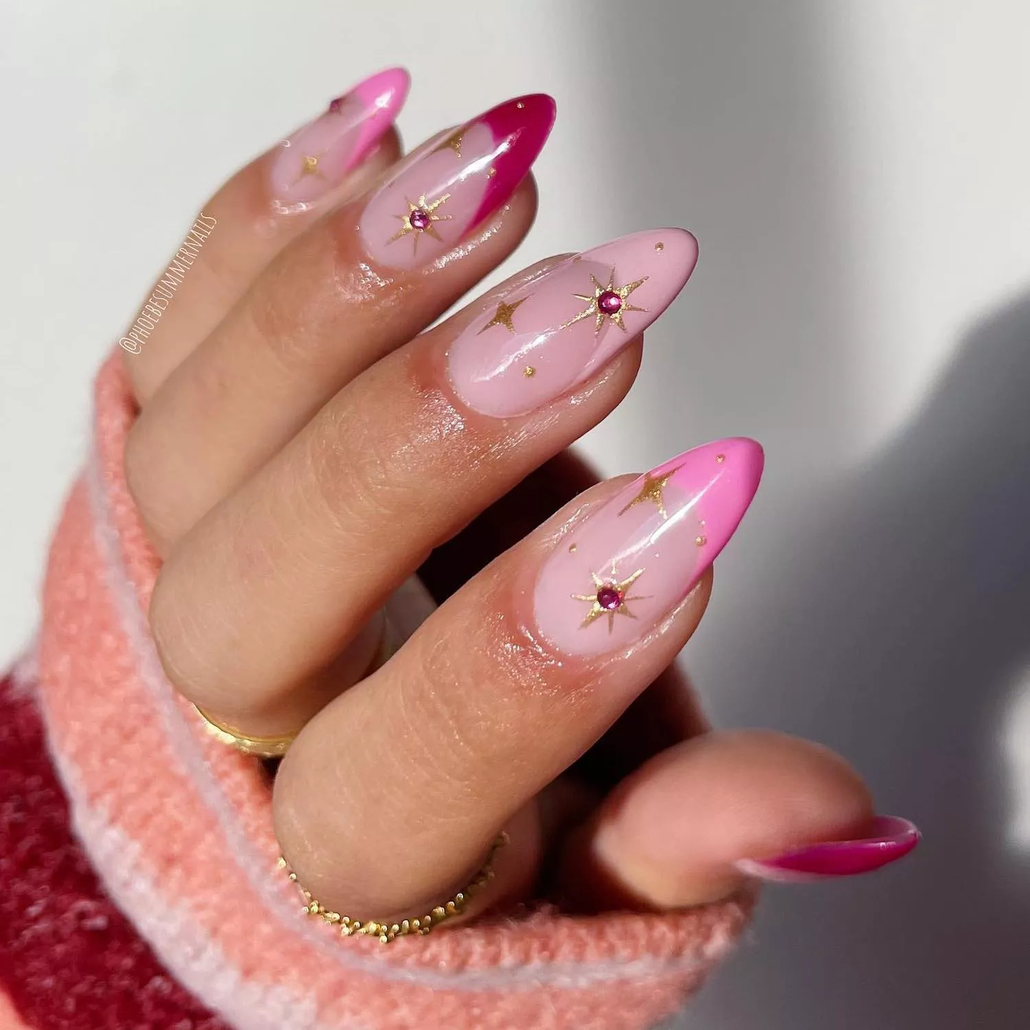 Multicolored pink French manicure with chrome star nail art