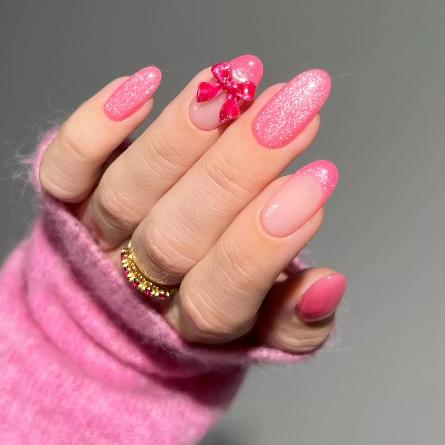 Pink glitter velvet manicure with hot pink 3D bow accent