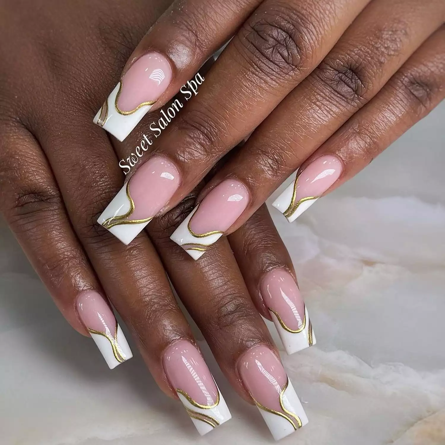 white and gold french nails 