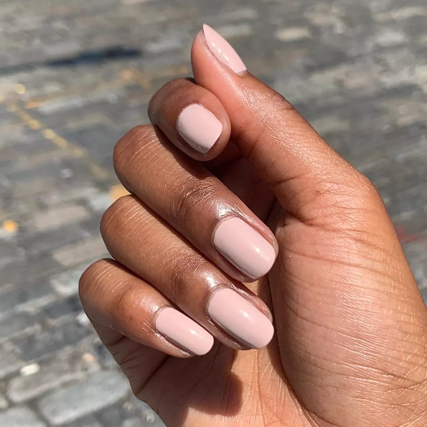 Close up of a neutral, soft manicure 