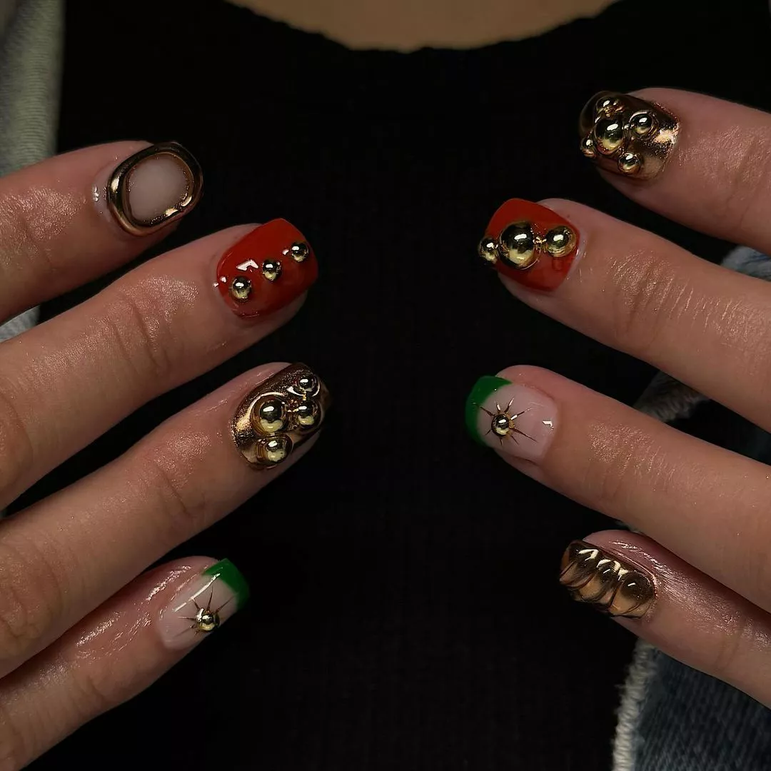 3d red, green, and gold nails 