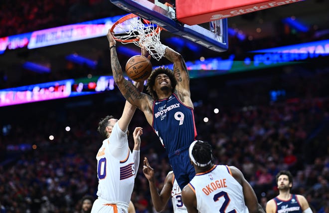 Nov. 4: Philadelphia 76ers guard Kelly Oubre Jr (9) dunks over Phoenix Suns center Jusuf Nurkic (20) in the third quarter at Wells Fargo Center.