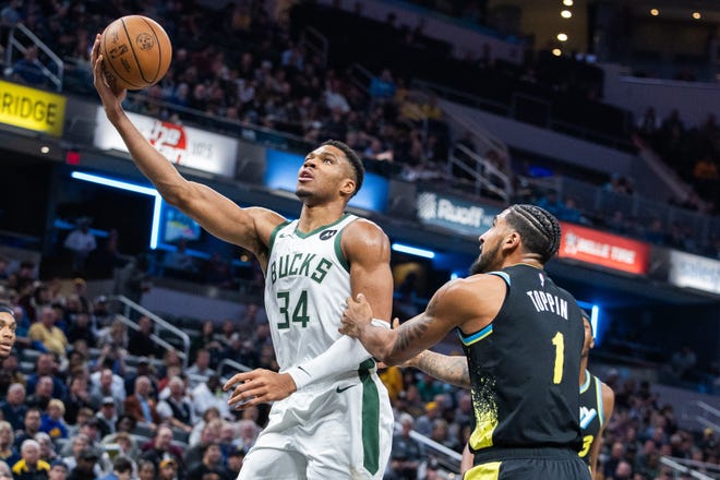 Nov. 9: Milwaukee Bucks forward Giannis Antetokounmpo (34) shoots against Indiana Pacers forward Obi Toppin (1) in the first quarter at Gainbridge Fieldhouse.