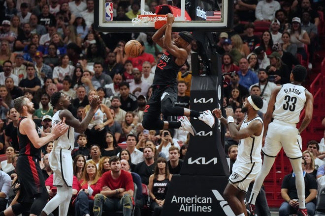 Nov. 16: Miami Heat forward Jimmy Butler dunks the ball against the Brooklyn Nets.