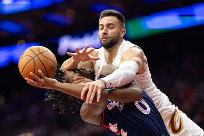 Nov. 21: Philadelphia 76ers guard Tyrese Maxey (0) is fouled by Cleveland Cavaliers guard Max Strus while driving for a shot during the fourth quarter at Wells Fargo Center.