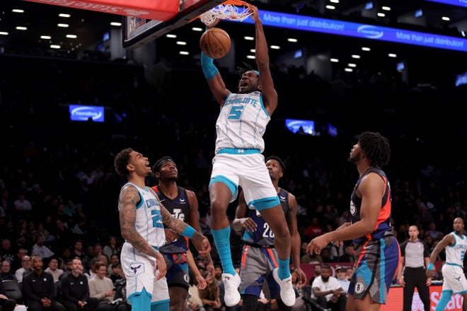 Nov. 30: Charlotte Hornets center Mark Williams dunks against the Brooklyn Nets.