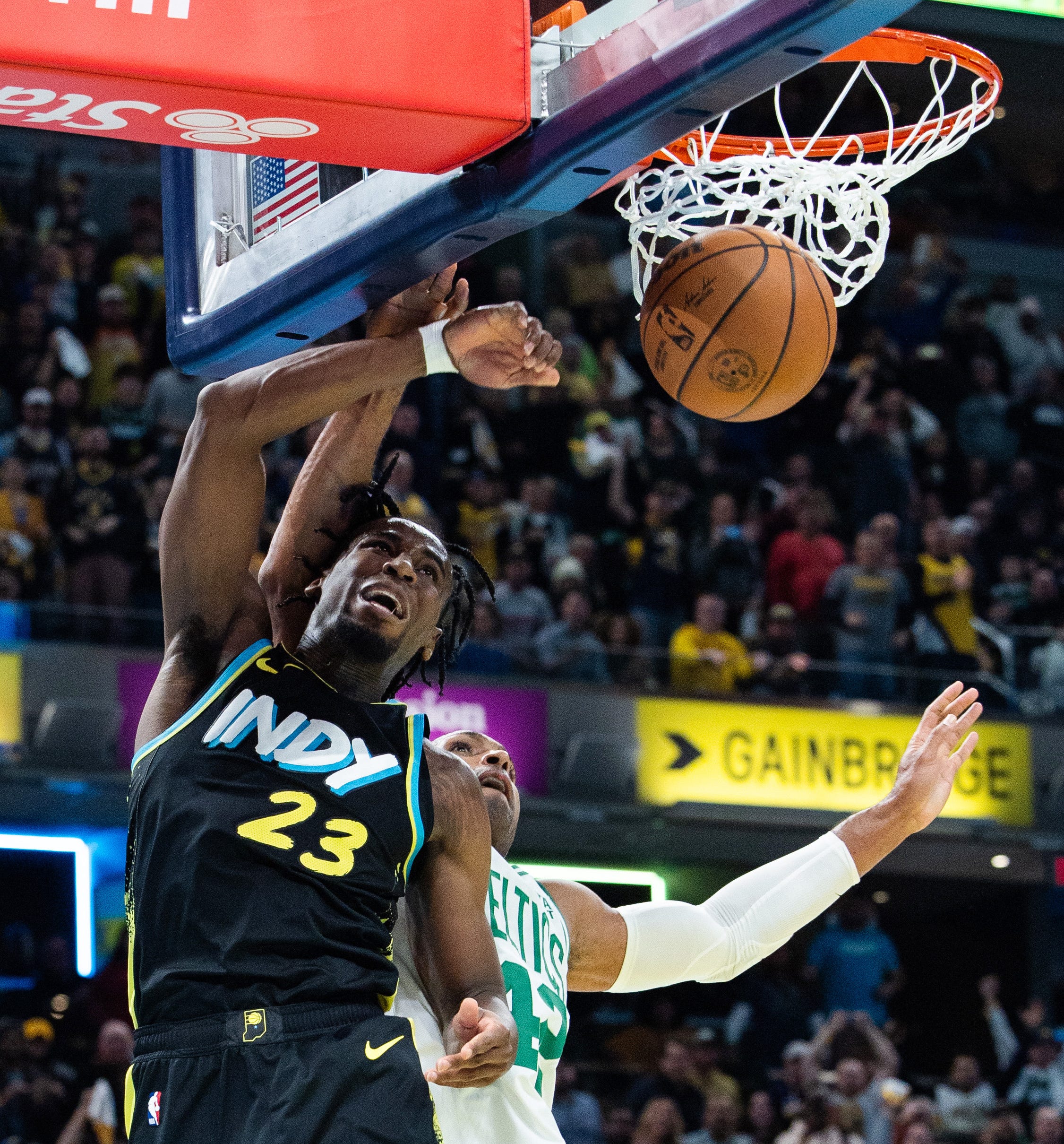 Dec. 4: The Indiana Pacers' Aaron Nesmith (23) shoots the ball while the Boston Celtics' Al Horford defends in the second half at Gainbridge Fieldhouse. The Pacers won the NBA In-Season Tournament quarterfinal game, 122-112.