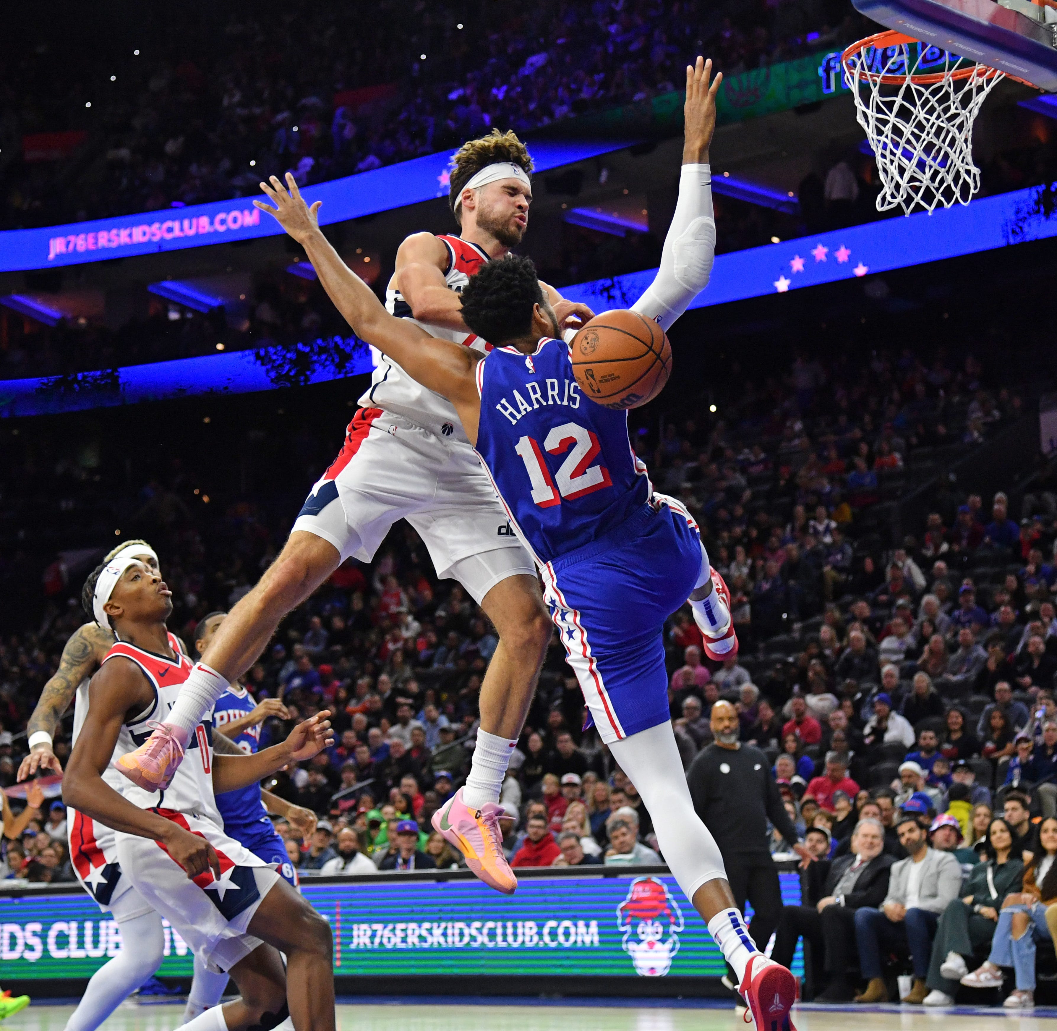 Dec. 11: The Philadelphia 76ers' Tobias Harris (12) is fouled by the Washington Wizards' Corey Kispert (24) during the second quarter at Wells Fargo Center.