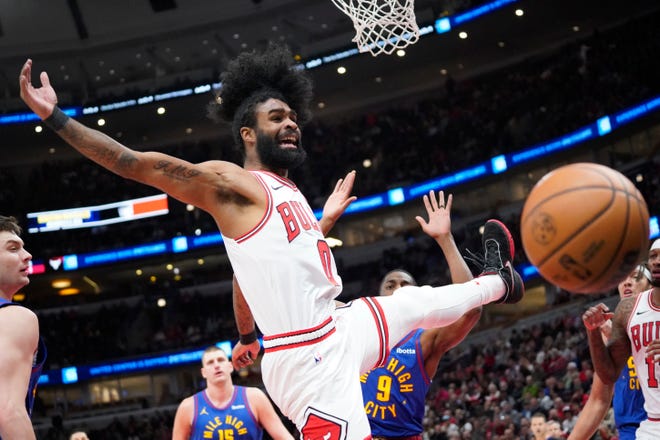 Dec. 12: The Chicago Bulls' Coby White (0) watches the ball go out of bounds against the Denver Nuggets during the first half at United Center.