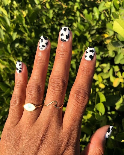 Cow print nails.