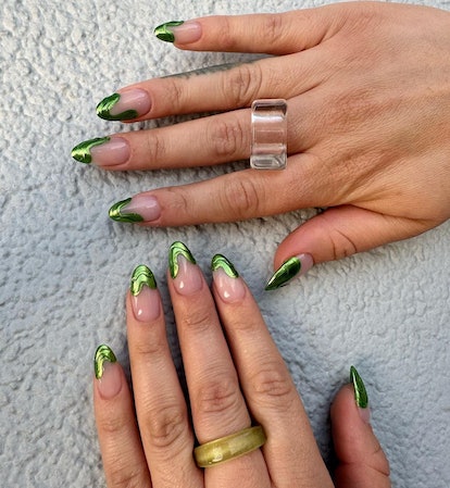 Vibrant green Frenchies that match the 3D chrome nail art trend.