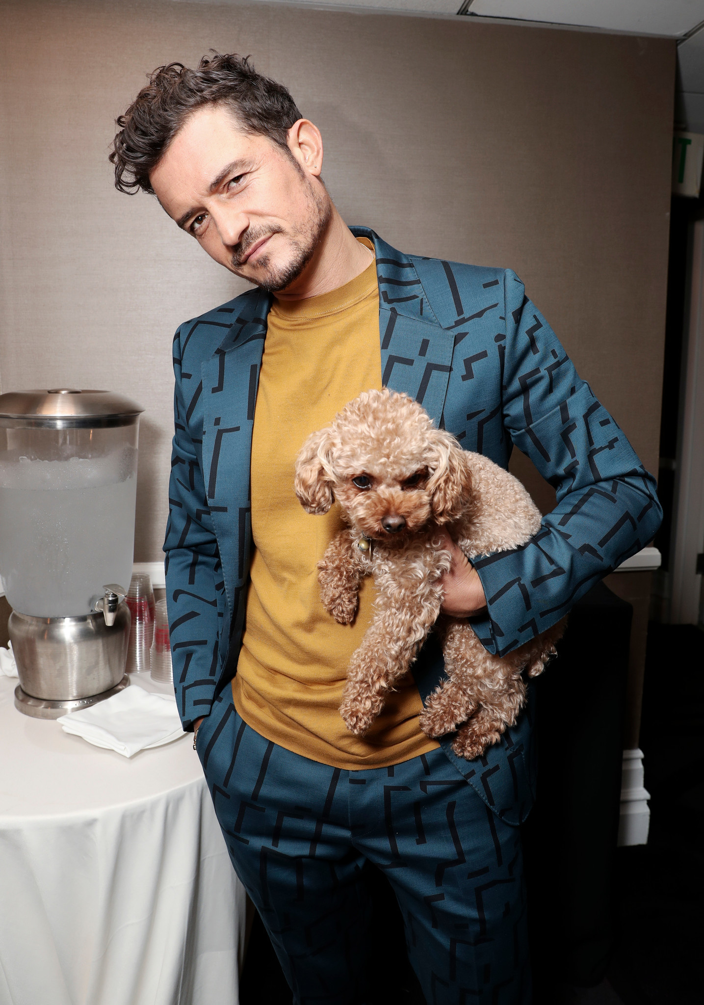 Orlando Bloom brings his dog Mighty along with him to promote