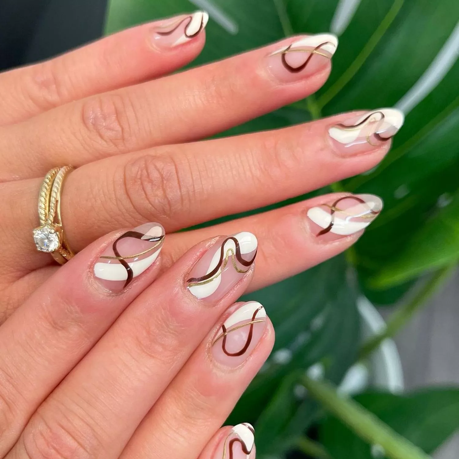 Abstract Neutral Swirl Nails in shades of white, brown, and gold