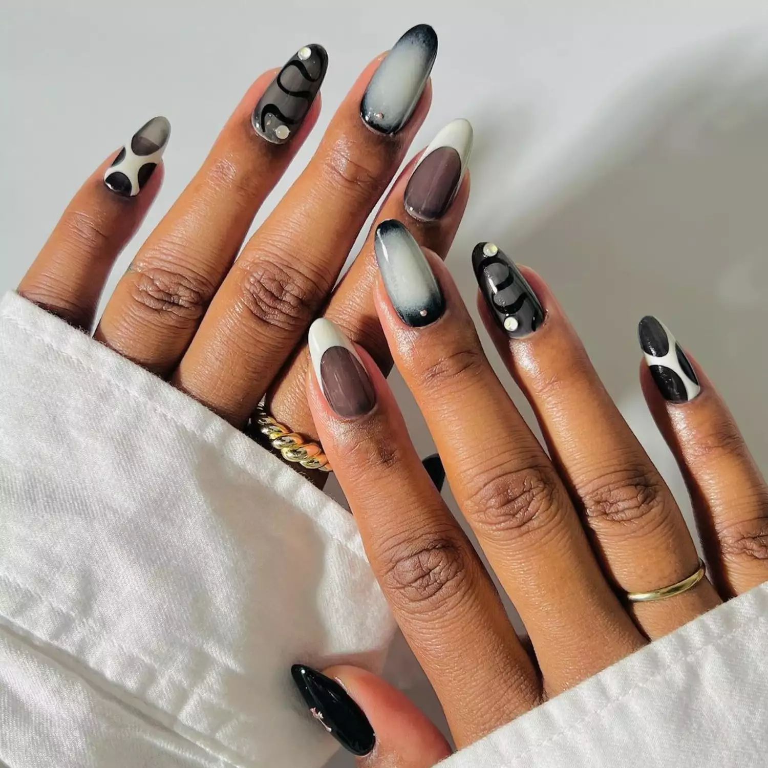 black mix and match stiletto nails