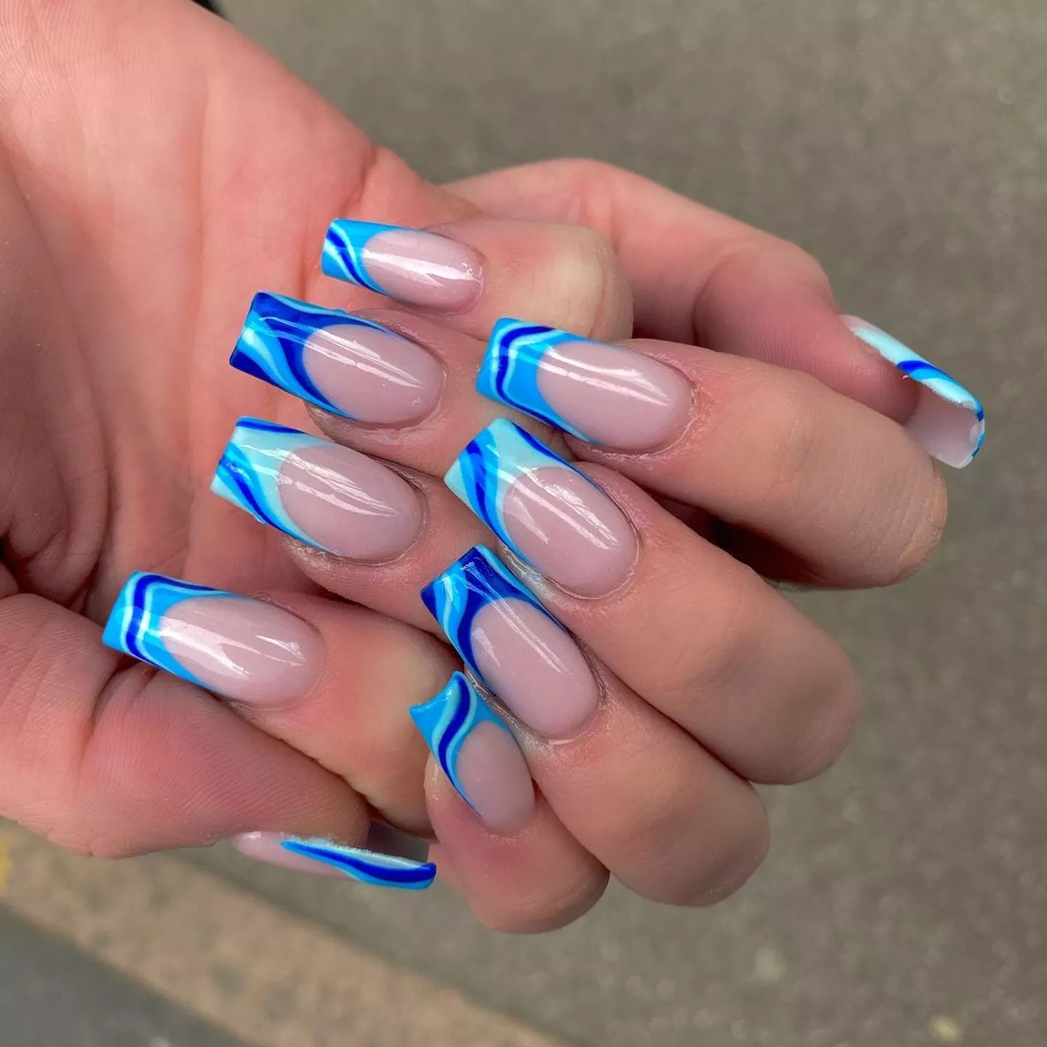 Blue Swirl French Tips with a neutral base