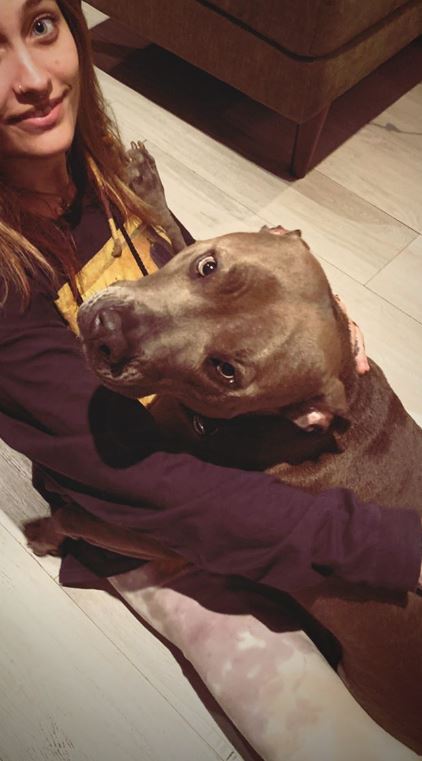 Paris Jackson spent some quality time with her dog Kenya on Aug. 13, 2020, who cuddled with the model on the floor.