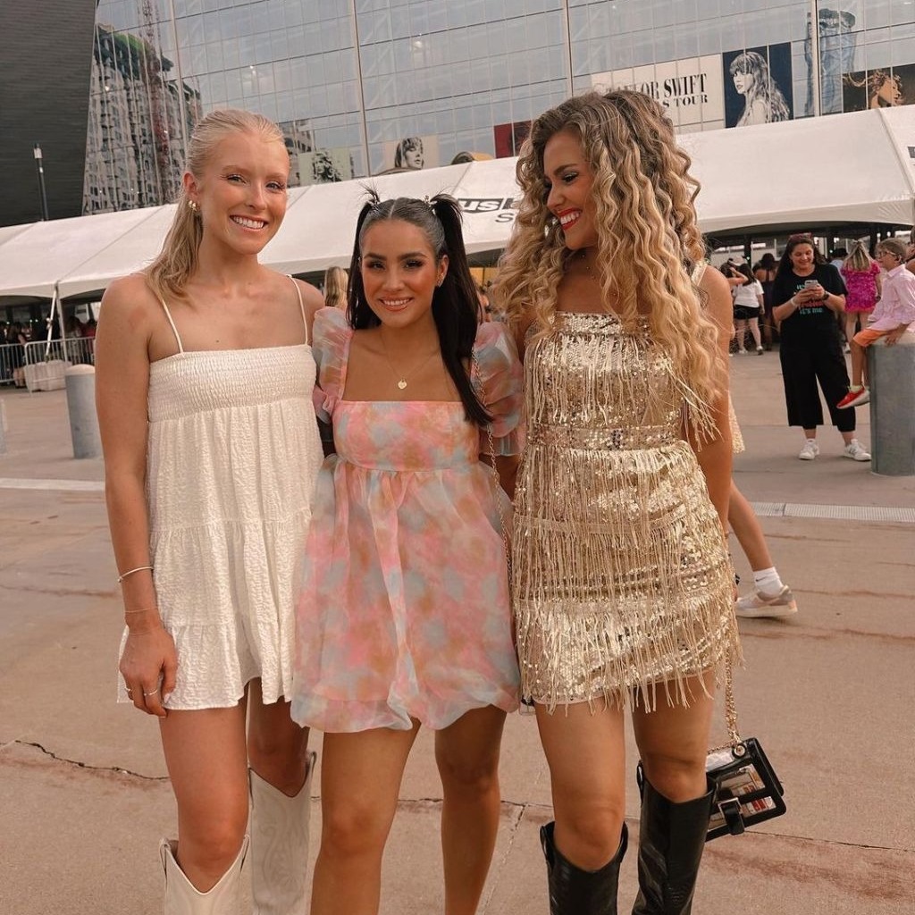 three girls wearing mini dresses inspired by the Debut Lover and Fearless albums