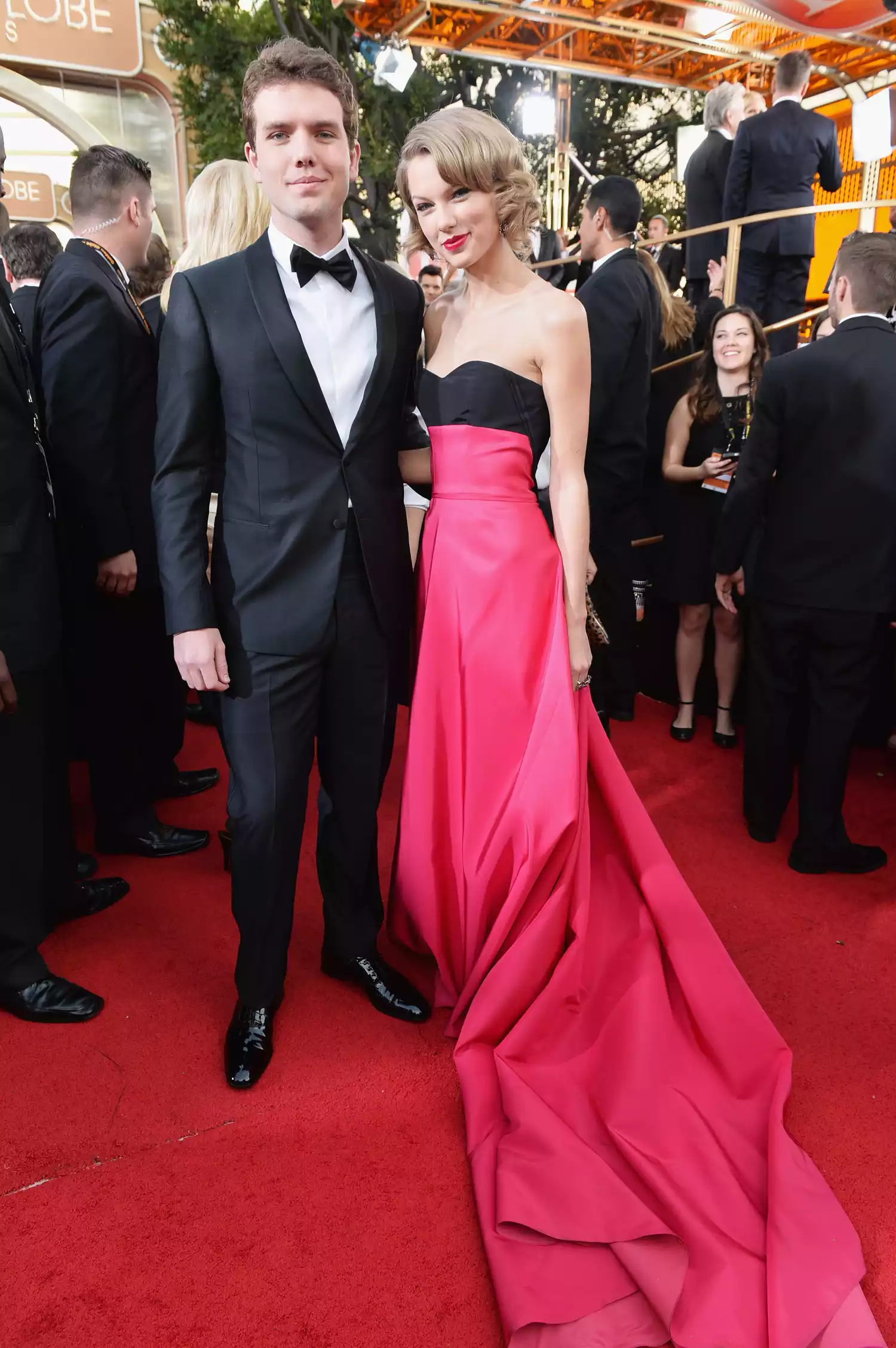 Austin Swift and singer Taylor Swift on the red carpet at the 71st Annual Golden Globe Awards