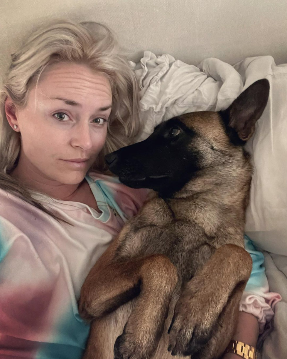 Olympian Lindsey Vonn enjoys some morning snuggles with her newest pup Jade on Thursday, April 28, 2022.