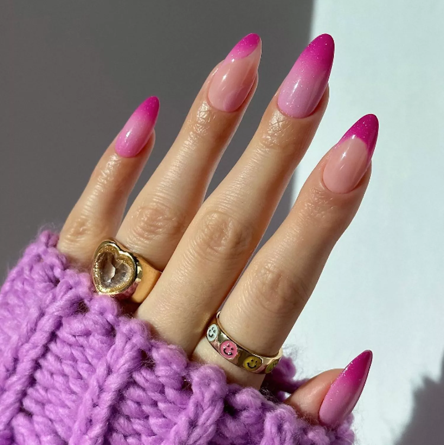 light pink and dark pink manicure with different detail on each nail