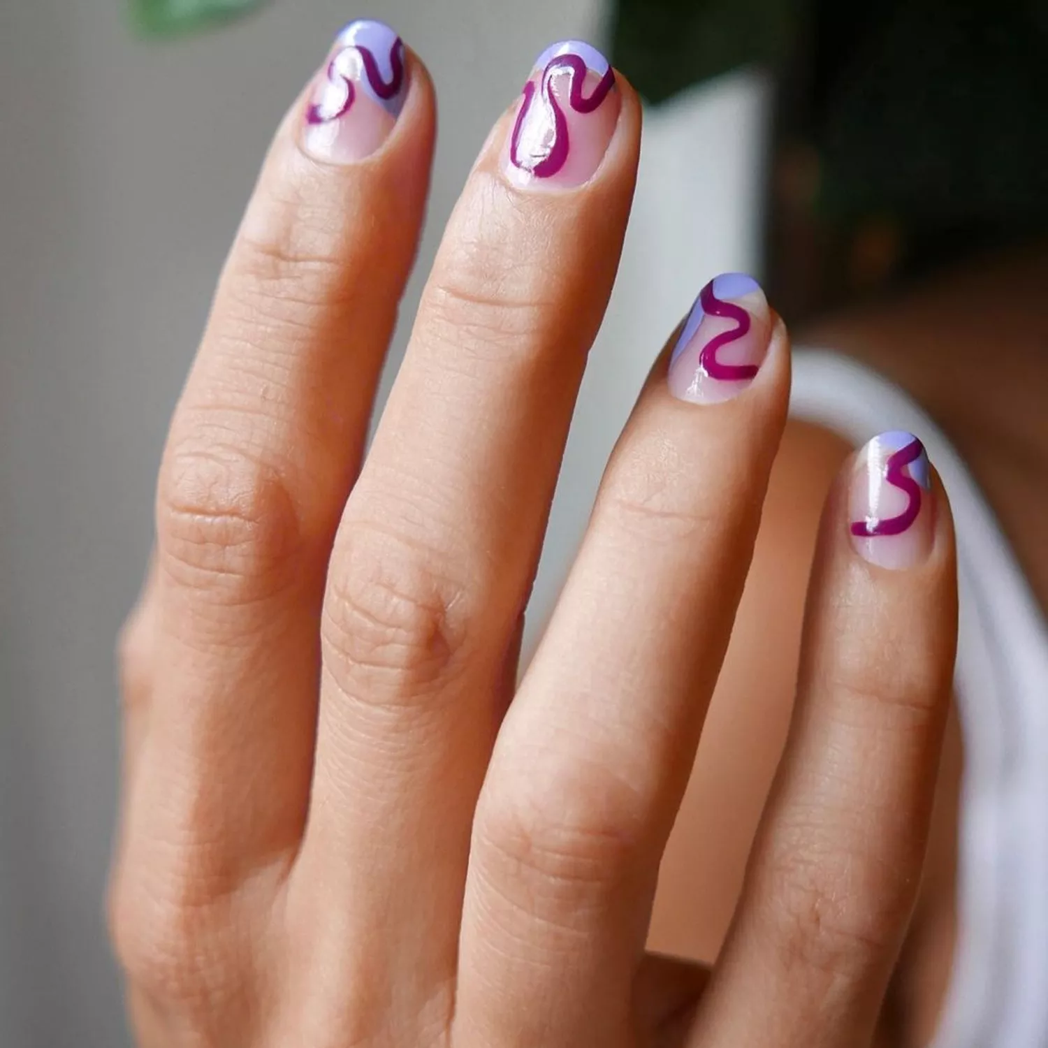 Simple Swirl Nails with purple tips and deep purple swirls