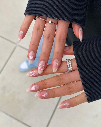 Pink bow nails.