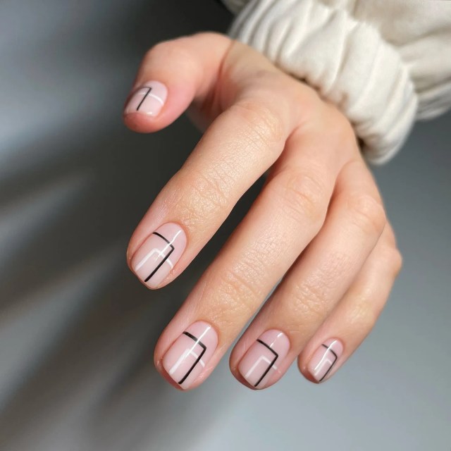 black and white geometric line nails