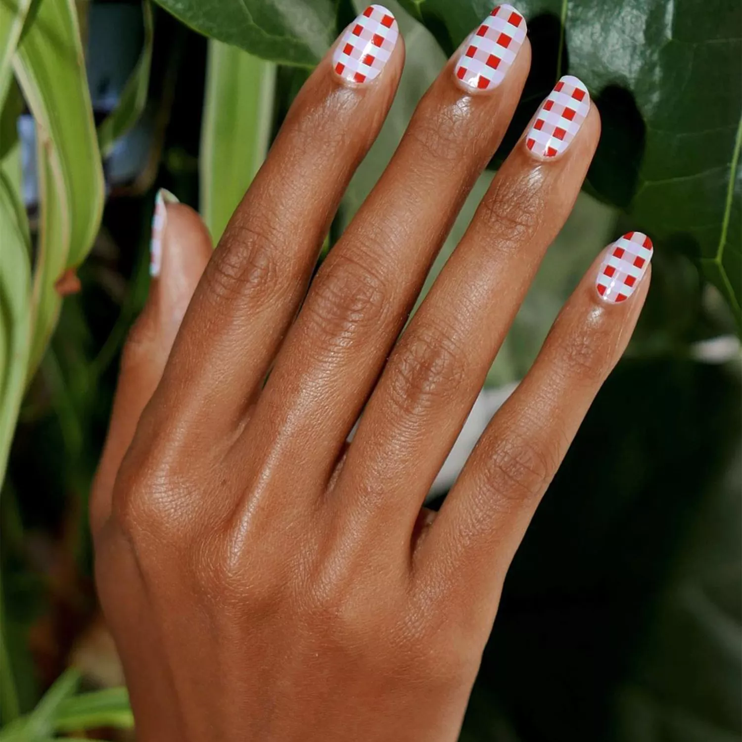 red plaid print manicure