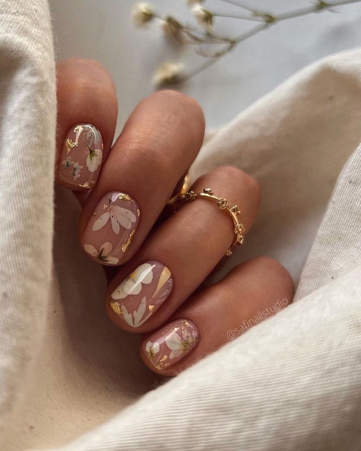 classy pressed flower short bridal wedding nail ideas with gold flakes