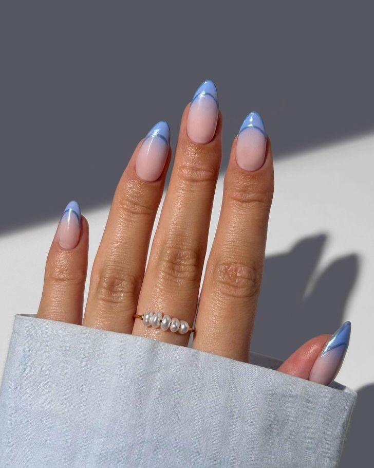 ombre blue new years nails with french tip outlines