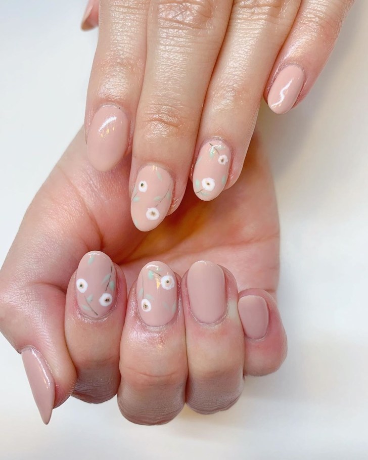 blush pink flower wedding nail design with sage green leaf accents and white blooms