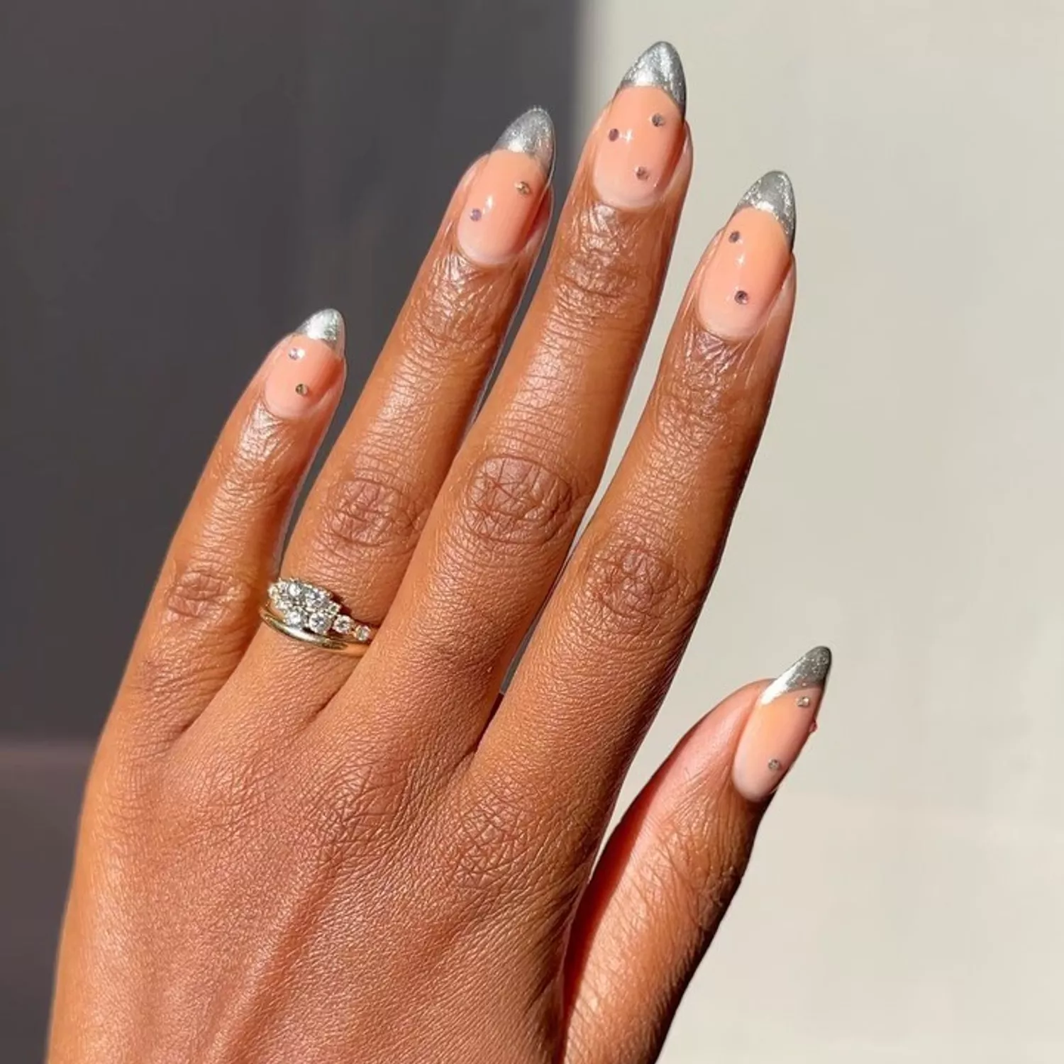 A manicure with silver velvet tips