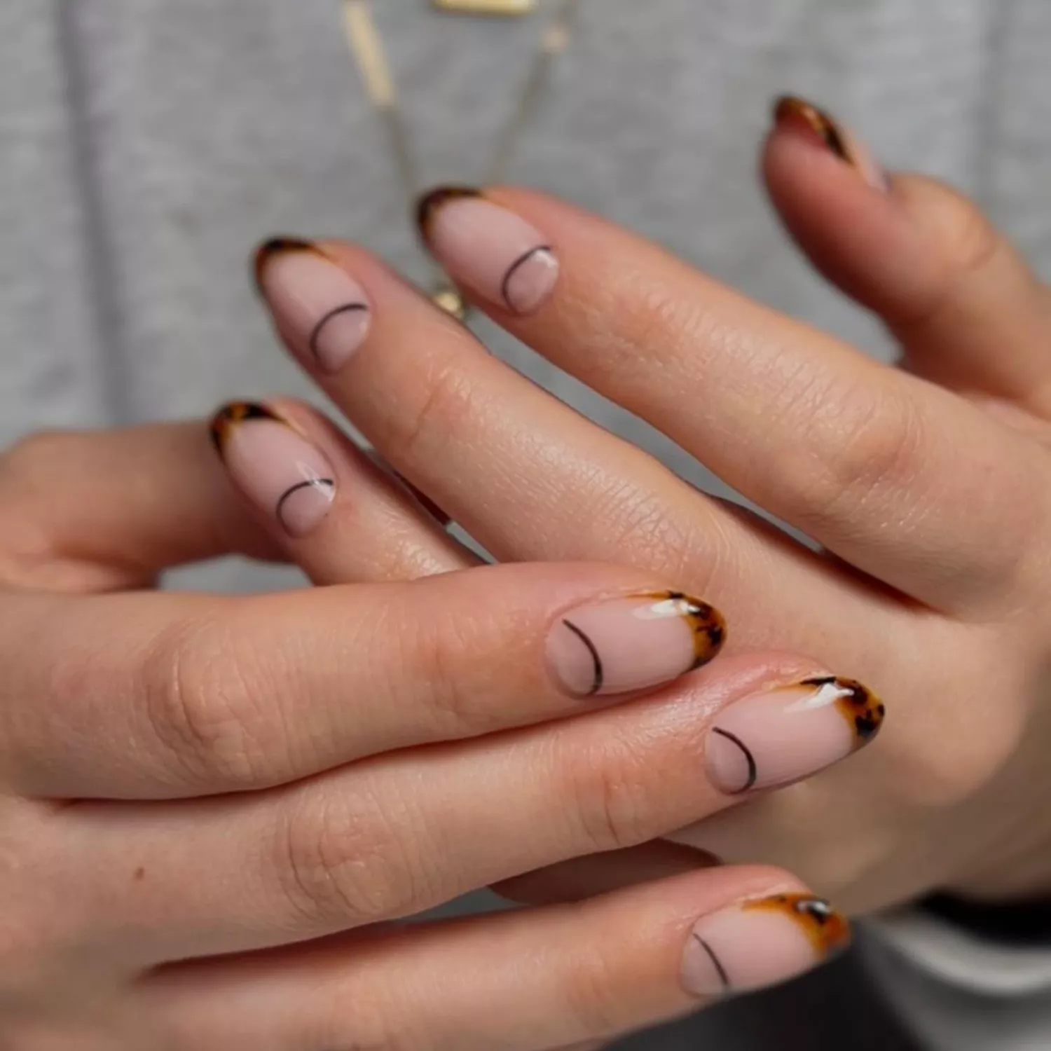 A tortoiseshell tipped manicure