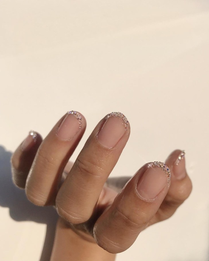 glitter accented Swarvoski crystal tip manicure