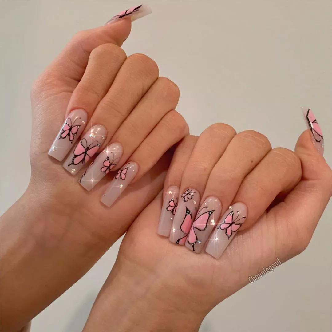 Kylie Jenner wearing pink butterfly nails