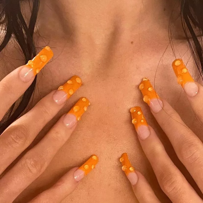 Kylie Jenner wearing orange nails