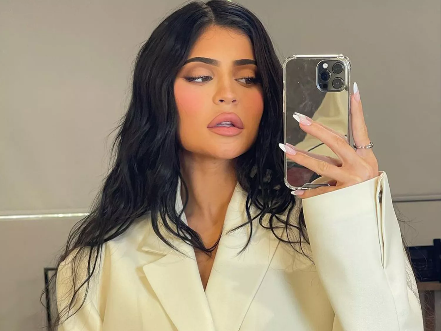 Kylie Jenner taking selfie in mirror