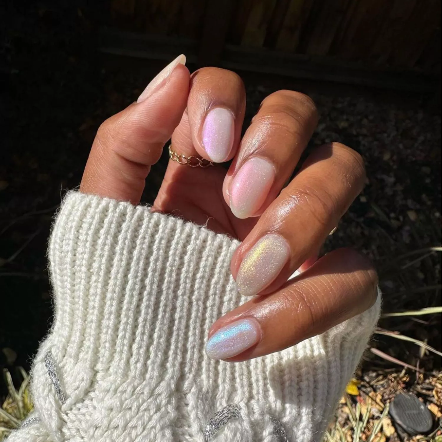 A sheer pearly, sparkly manicure.