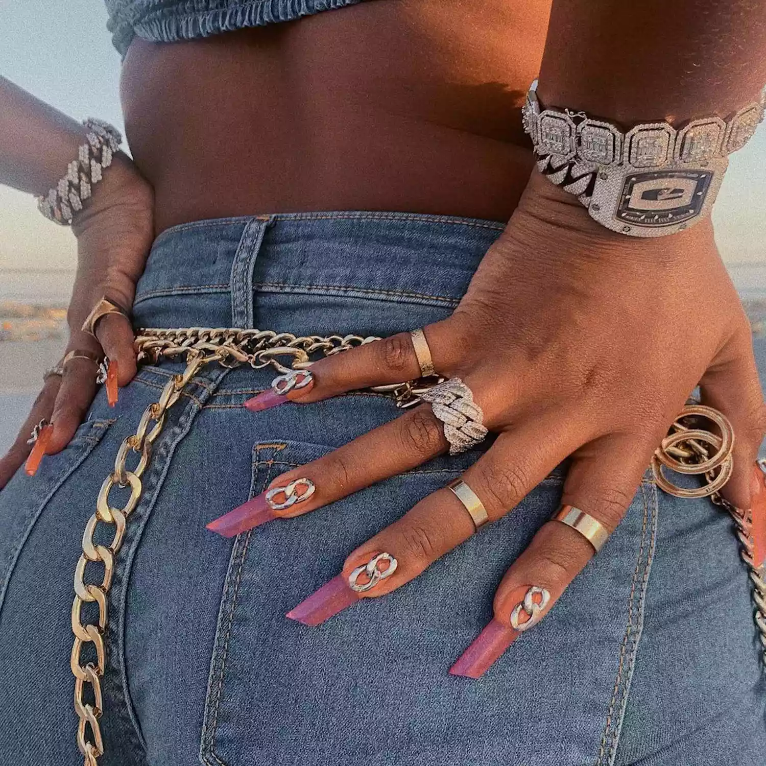 purple and orange jelly nails on megan thee stallion