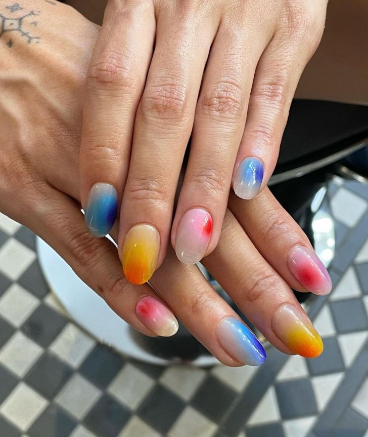 mismatched blue red and yellow aura nails design