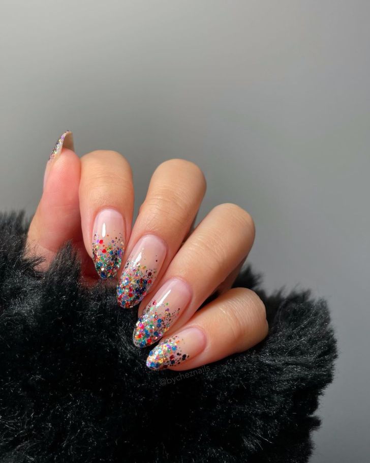 rainbow glitter ombre new years eve nails with a glossy top coat