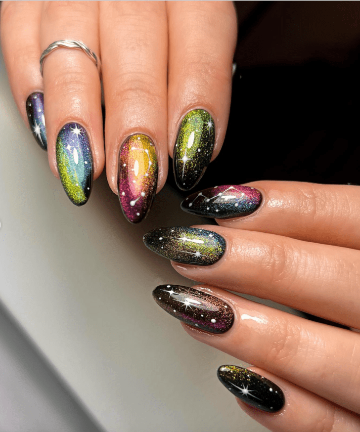 rainbow holographic velvet new years nails with white constellation designs