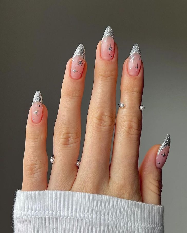 silver glitter french tip new years nails with celestial NYE nail art designs