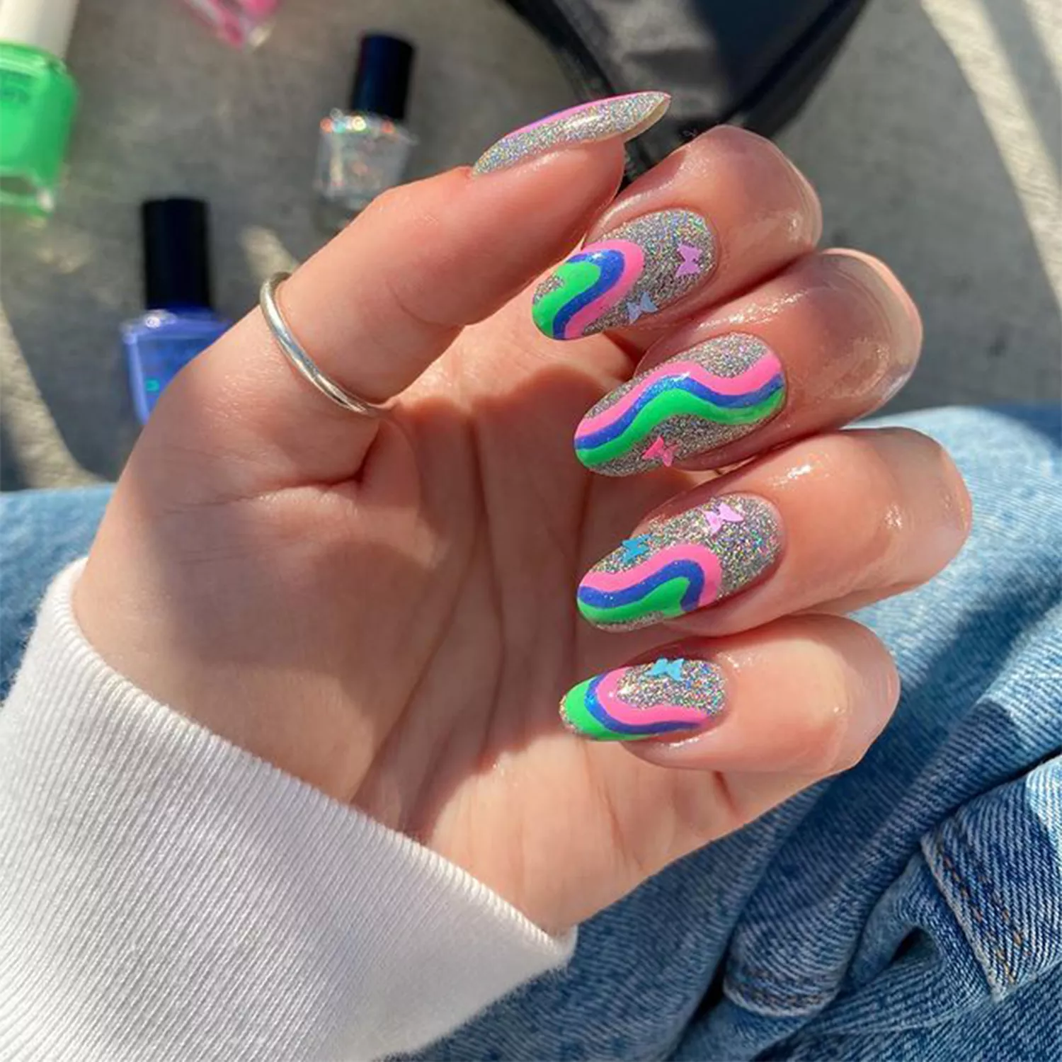 neon and silver swirl nails