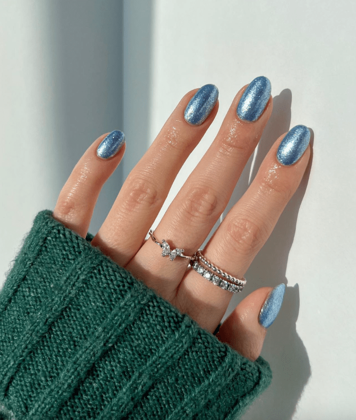 short and simple holographic glitter blue new years nails